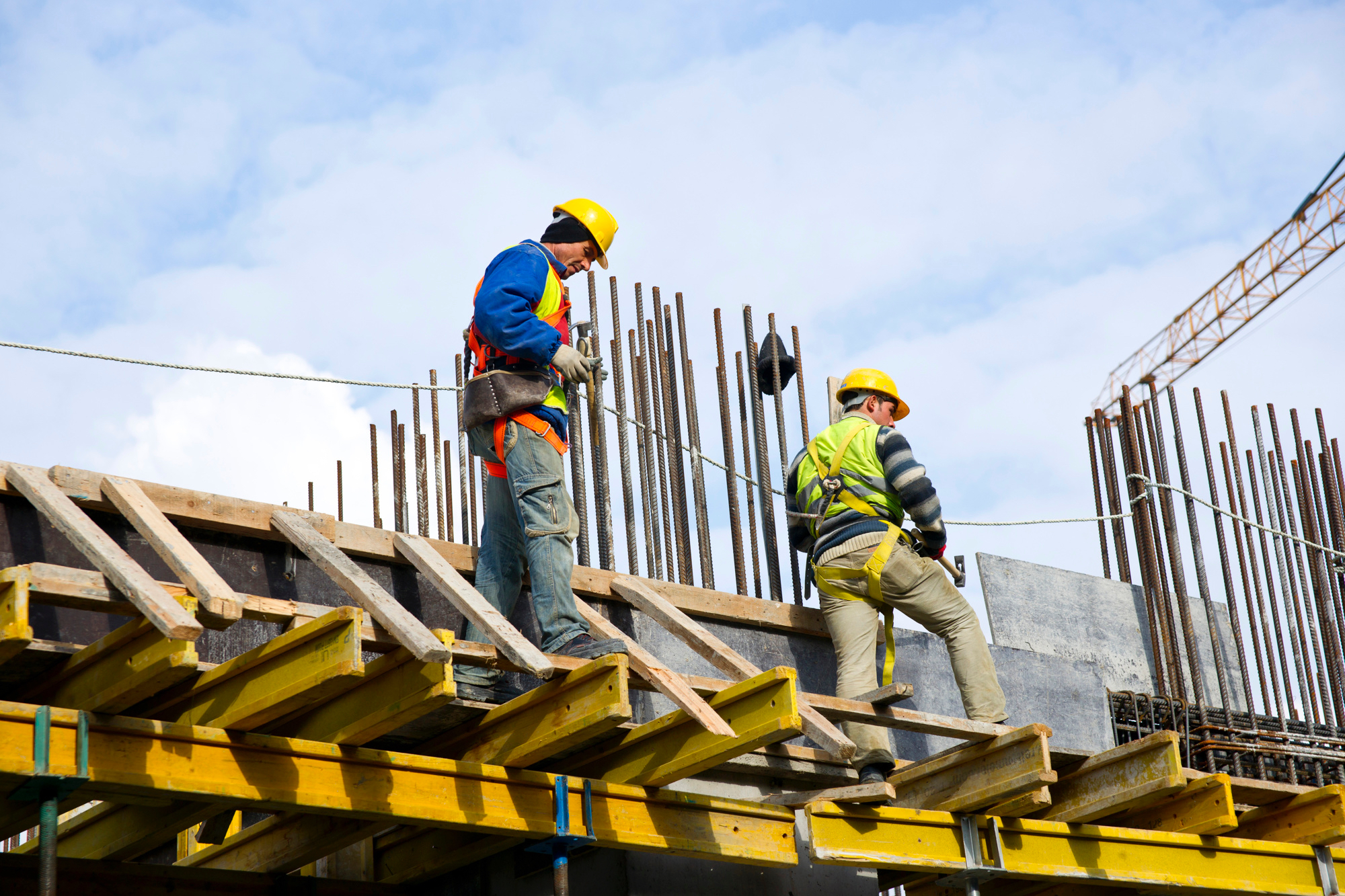workers examining work